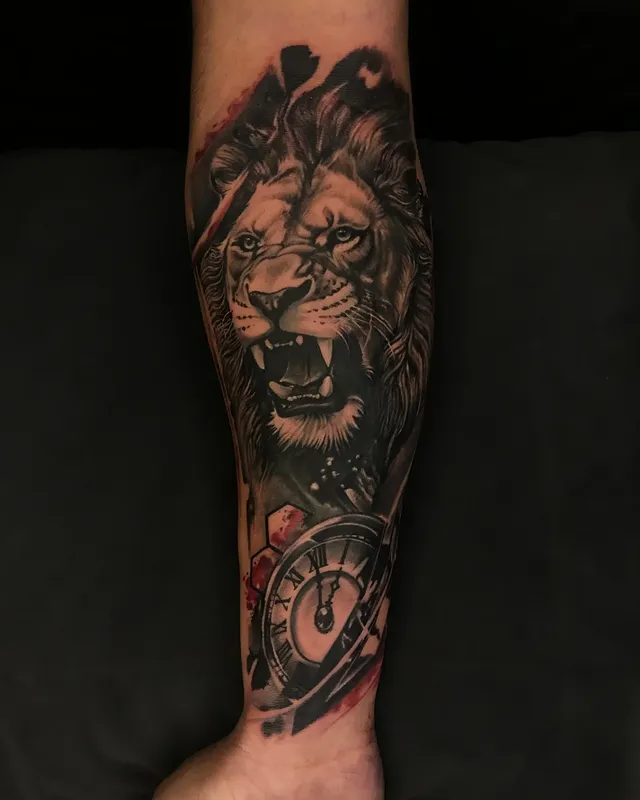 Roaring lion with clock black and grey realism forearm sleeve, Dev Tattoo & Art Kolkata