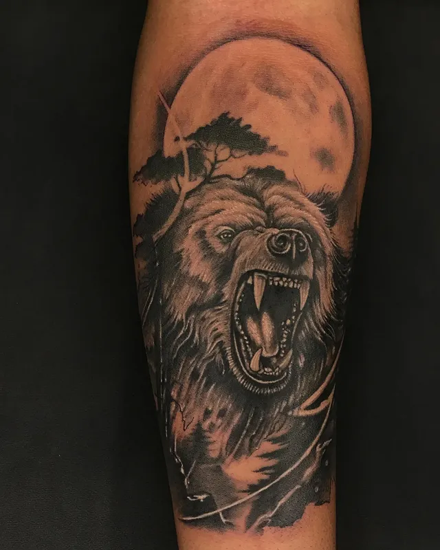 Roaring bear under moon black and grey realism forearm tattoo, Dev Tattoo & Art Kolkata