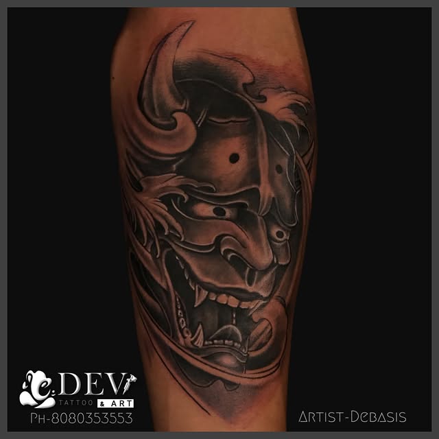 Black and grey Japanese Hannya mask forearm tattoo by Debasis, Dev Tattoo & Art Kolkata
