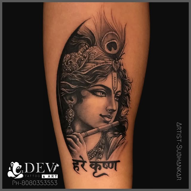 Lord Krishna with flute and peacock feather religious tattoo by Subhankar, Dev Tattoo & Art Kolkata