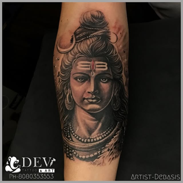 Lord Shiva forearm portrait tattoo by Debasis, Dev Tattoo & Art Kolkata